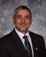 Mr. Christopher Poulos 